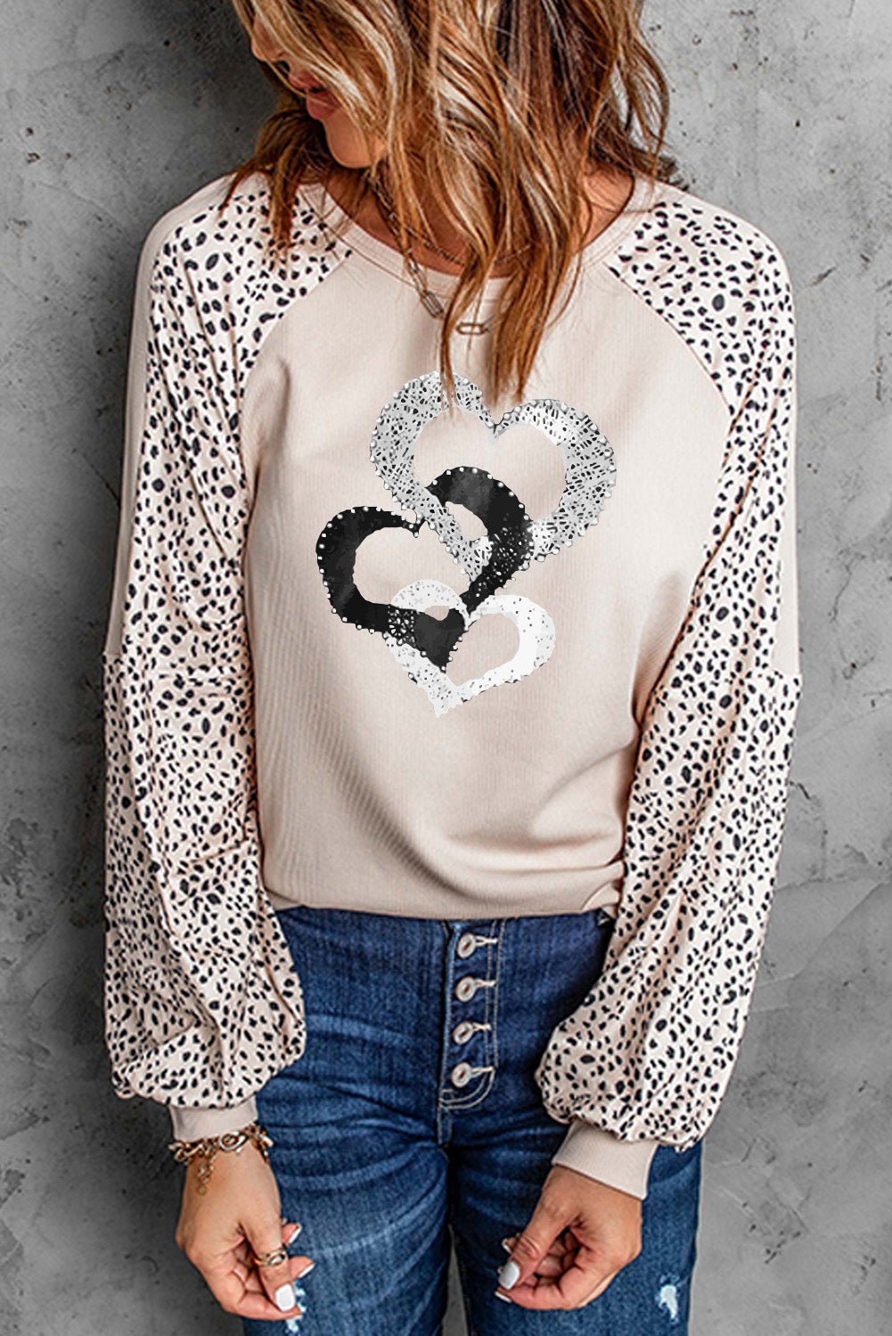 Leopard Heart Long Sleeve Pullover featuring a stylish leopard print and heart design, perfect for casual wear in spring and autumn.