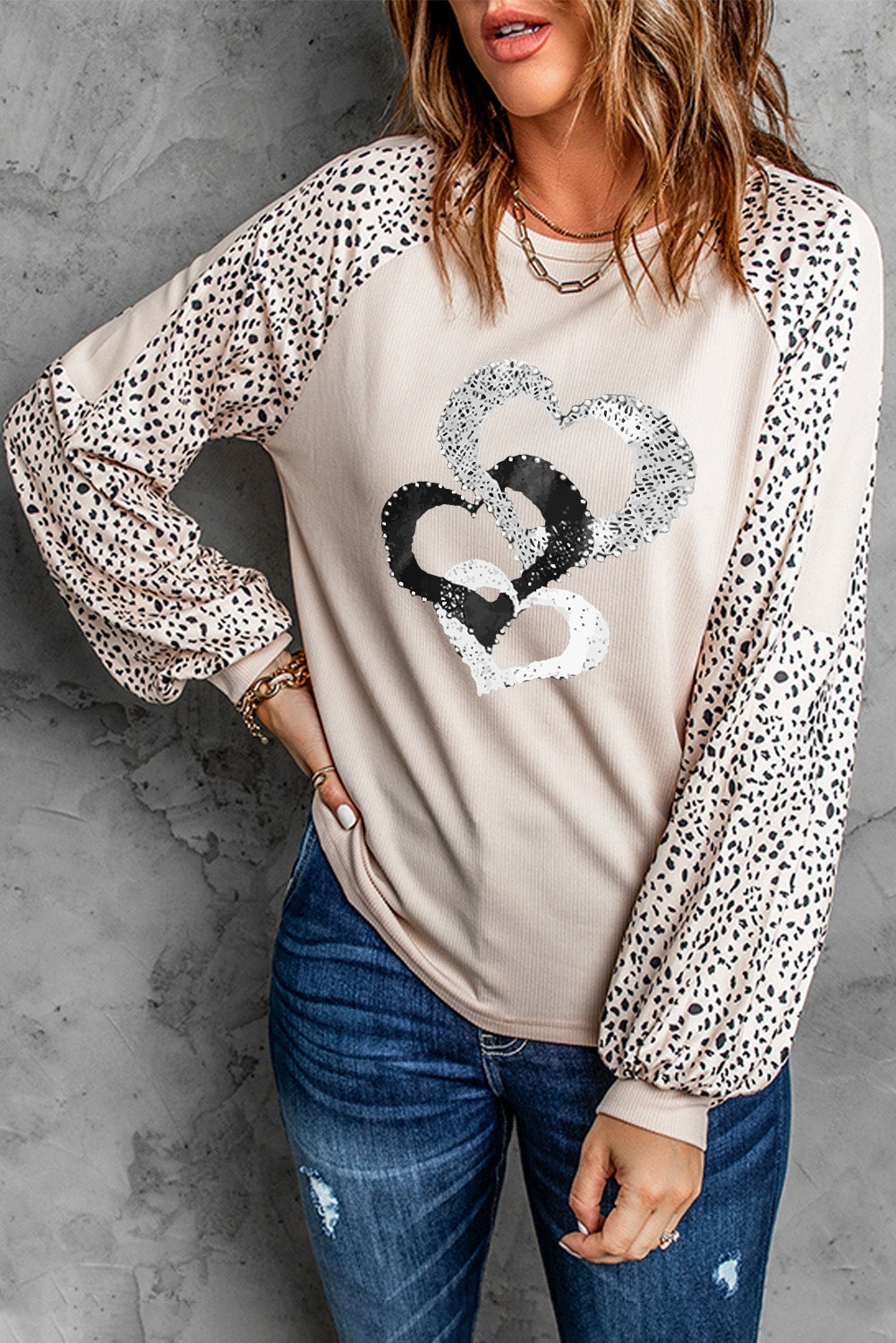 Leopard Heart Long Sleeve Pullover featuring a stylish leopard print and heart design, perfect for casual wear in spring and autumn.