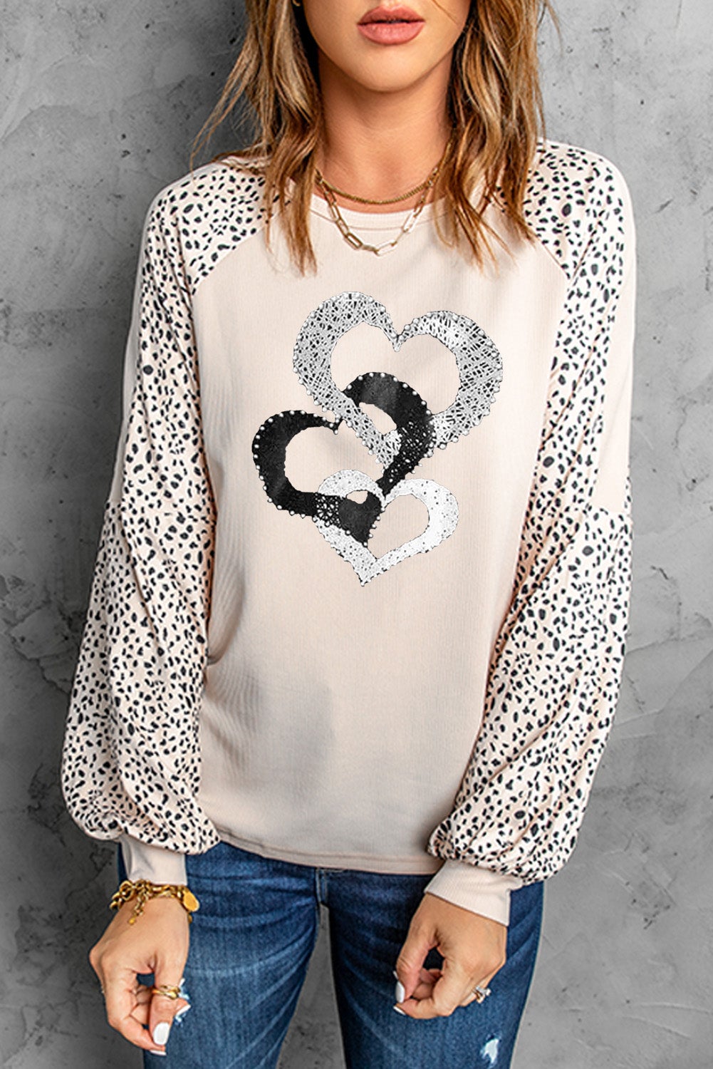 Leopard Heart Long Sleeve Pullover featuring a stylish leopard print and heart design, perfect for casual wear in spring and autumn.