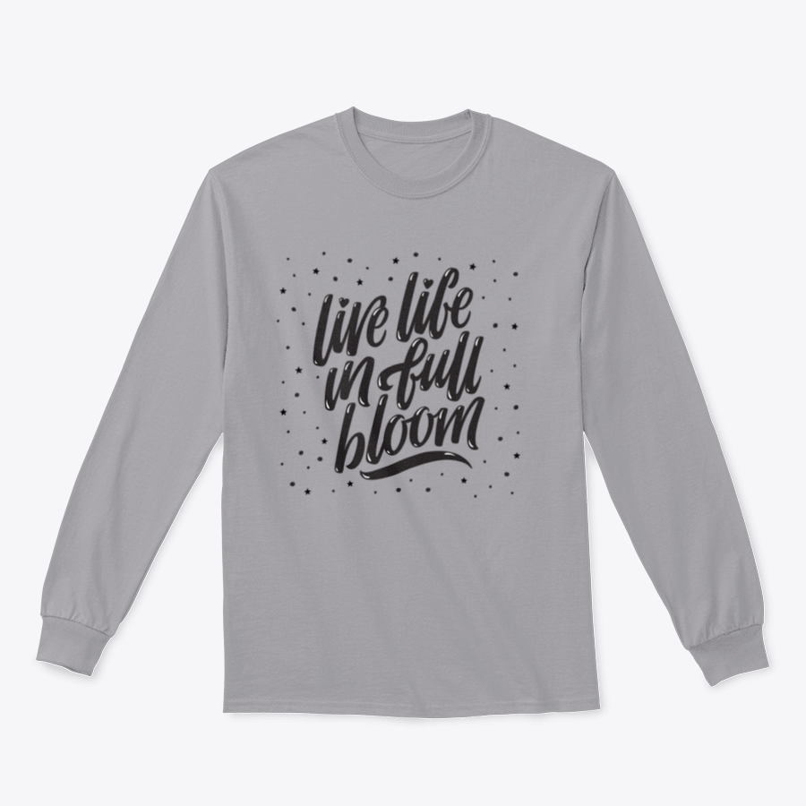 A stylish black T-shirt featuring the inspirational saying 'Live Life In Full Bloom' in elegant brush lettering.