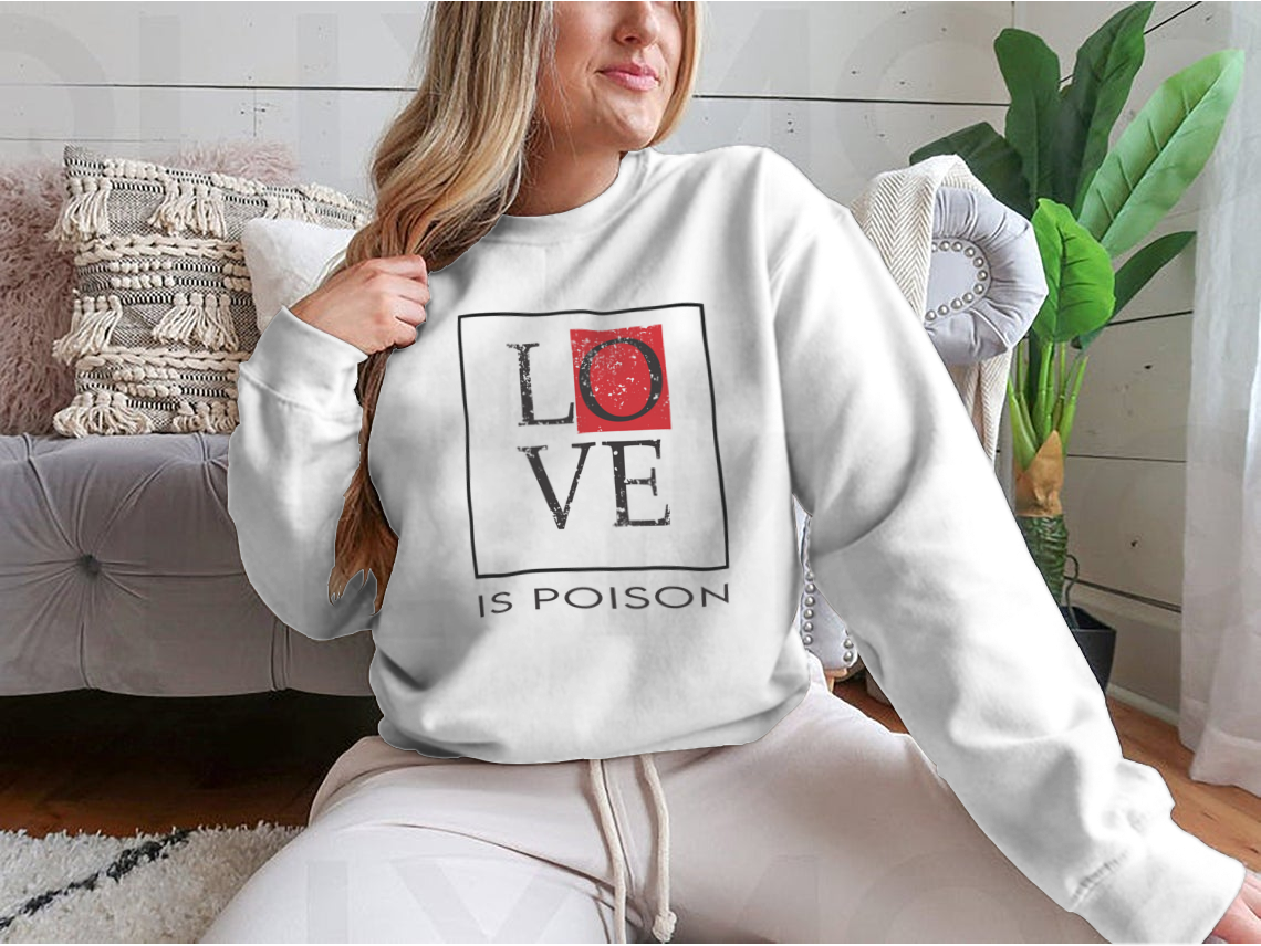 A stylish T-shirt featuring the bold 'Love Is Poison' graphic print, made from soft cotton fabric, perfect for casual wear.