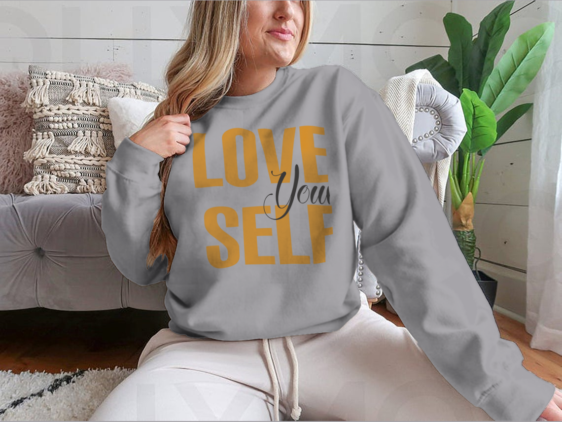 A stylish tee featuring the inspirational quote 'Love Your Self' printed on a soft cotton fabric, perfect for casual wear.