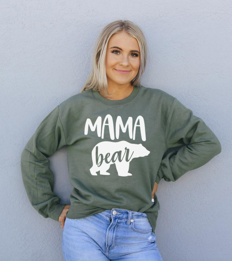 Cozy unisex Mama Bear Sweatshirt featuring a crew neck and soft fabric blend, perfect for casual wear.