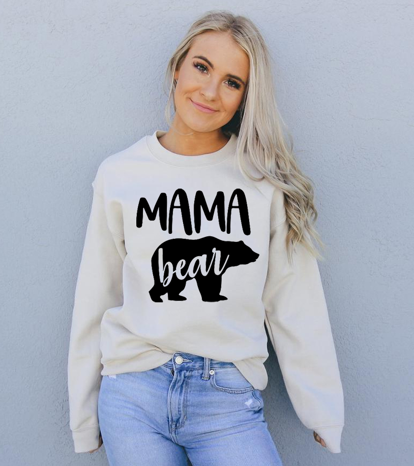 Cozy unisex Mama Bear Sweatshirt featuring a crew neck and soft fabric blend, perfect for casual wear.