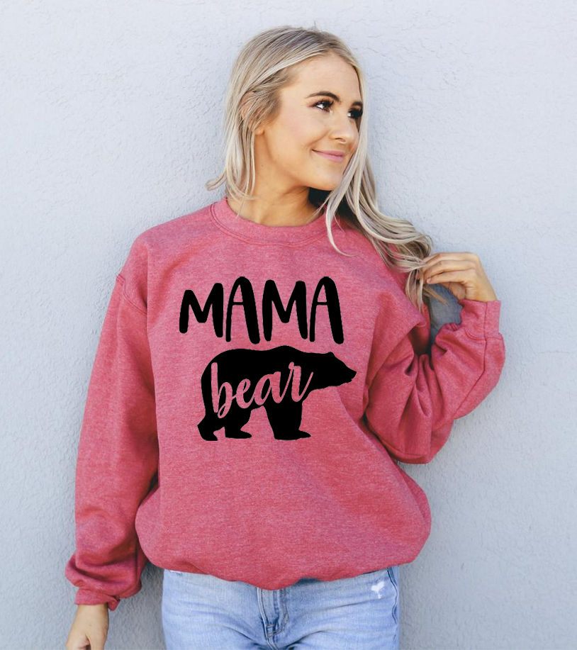 Cozy unisex Mama Bear Sweatshirt featuring a crew neck and soft fabric blend, perfect for casual wear.