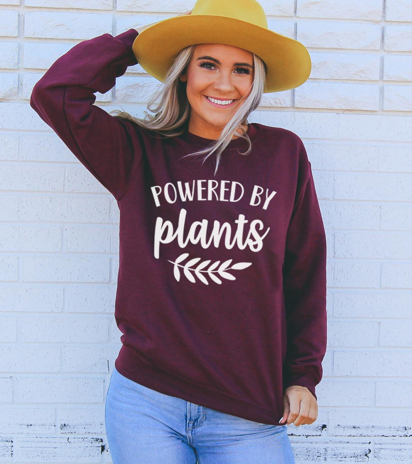 A cozy unisex sweatshirt featuring a crew neck, made from a soft cotton-polyester blend, perfect for casual wear.