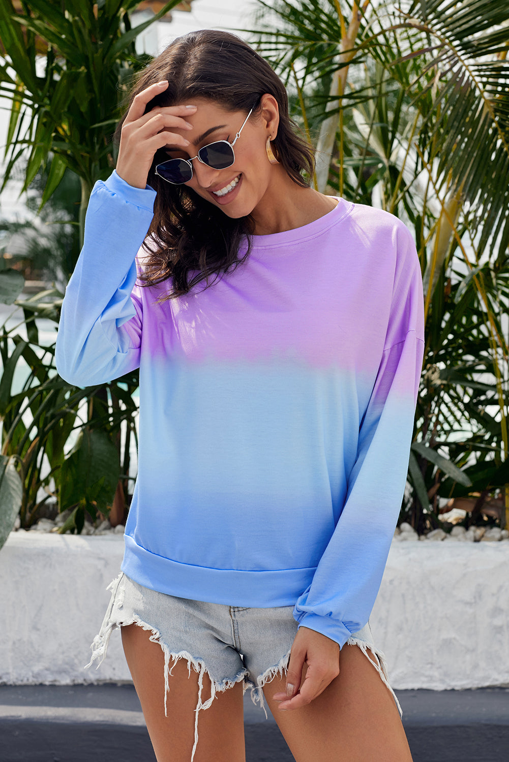 Purple blue color block tie dye pullover sweatshirt with oversized fit and gathered cuffs, perfect for casual wear.