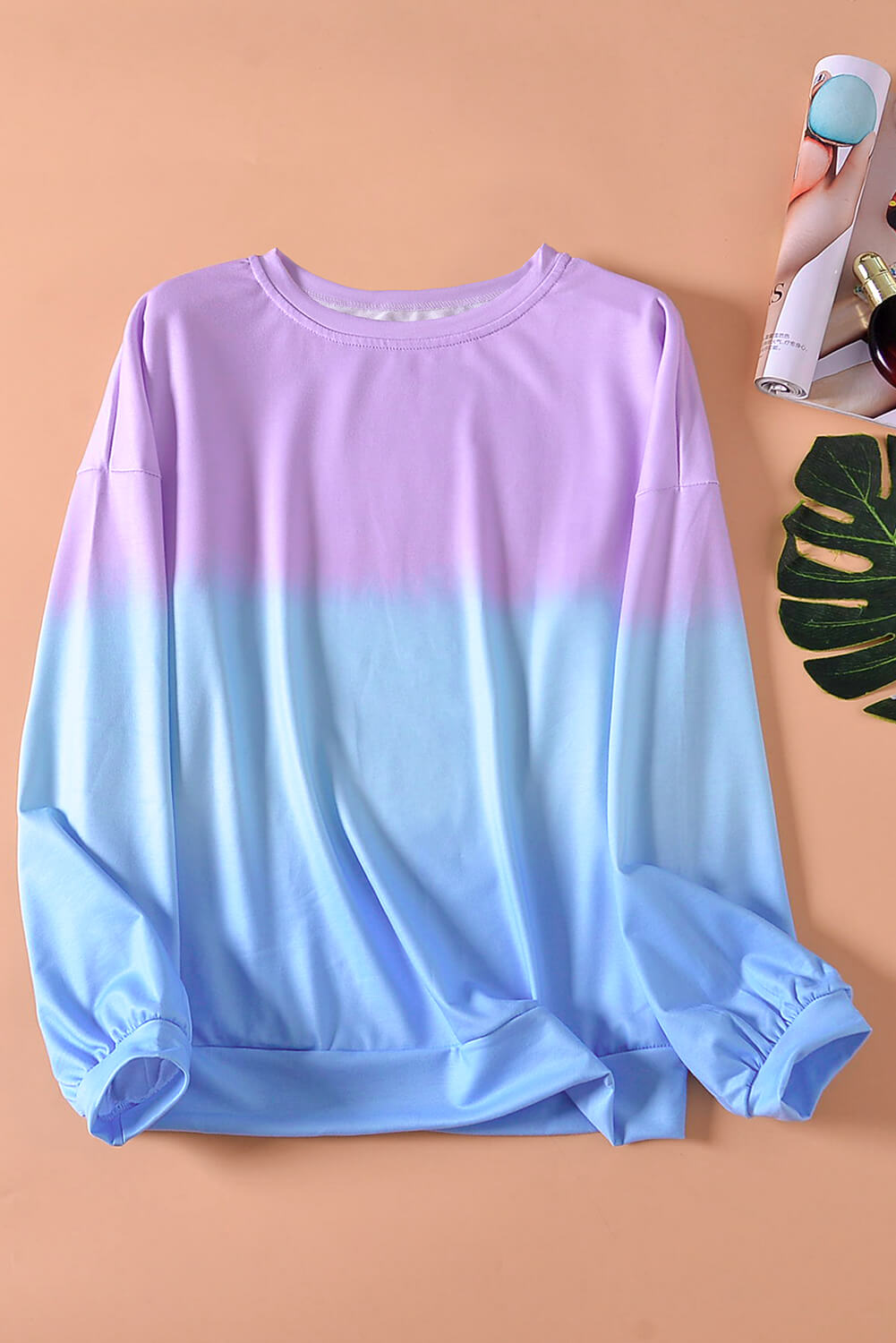 Purple blue color block tie dye pullover sweatshirt with oversized fit and gathered cuffs, perfect for casual wear.