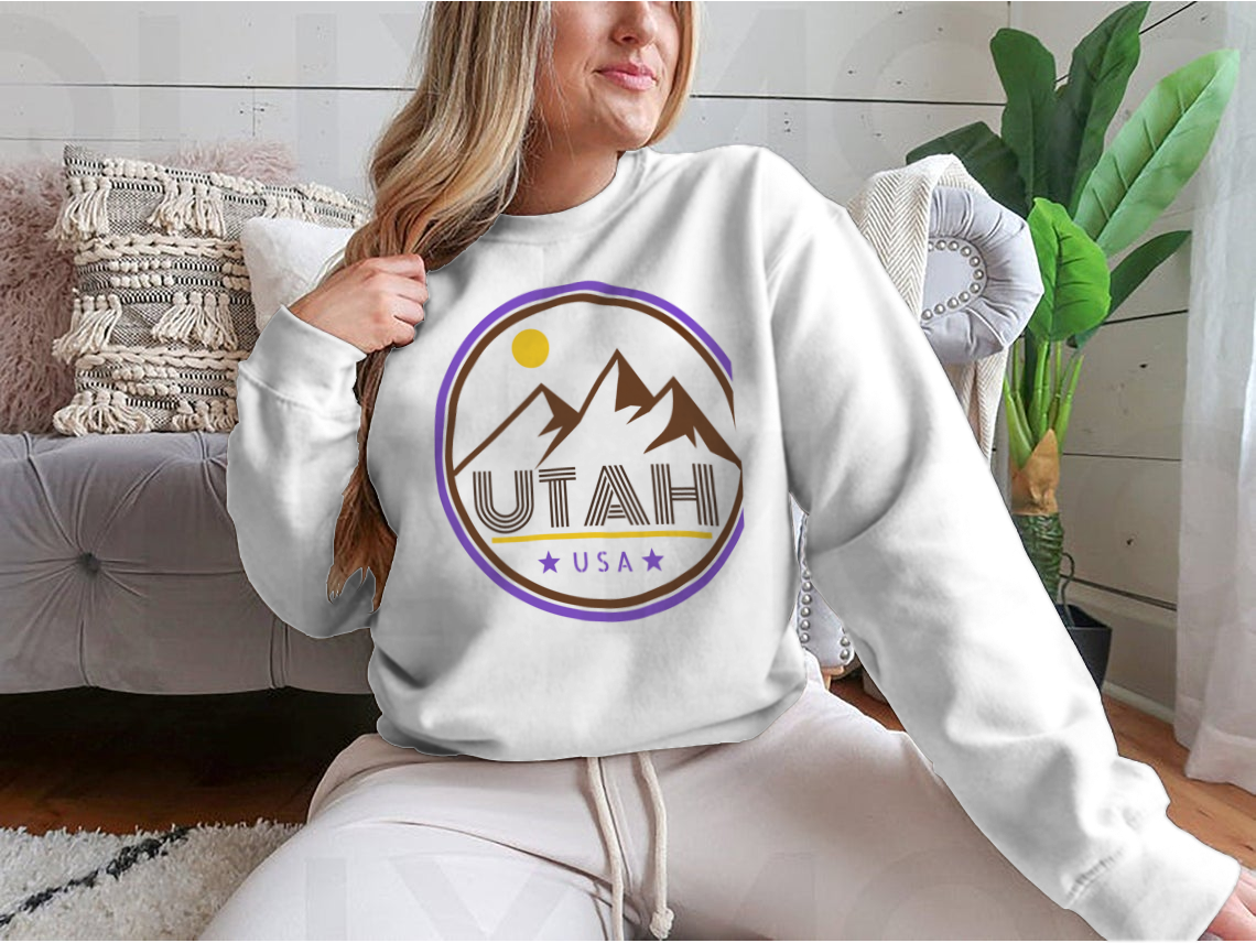 Retro Vintage Utah Badge T-shirt featuring mountains and sunshine design, made from 100% cotton for comfort and style.