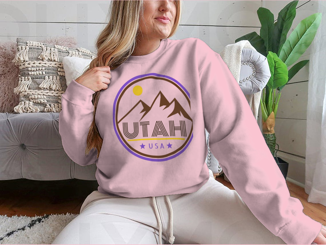 Retro Vintage Utah Badge T-shirt featuring mountains and sunshine design, made from 100% cotton for comfort and style.