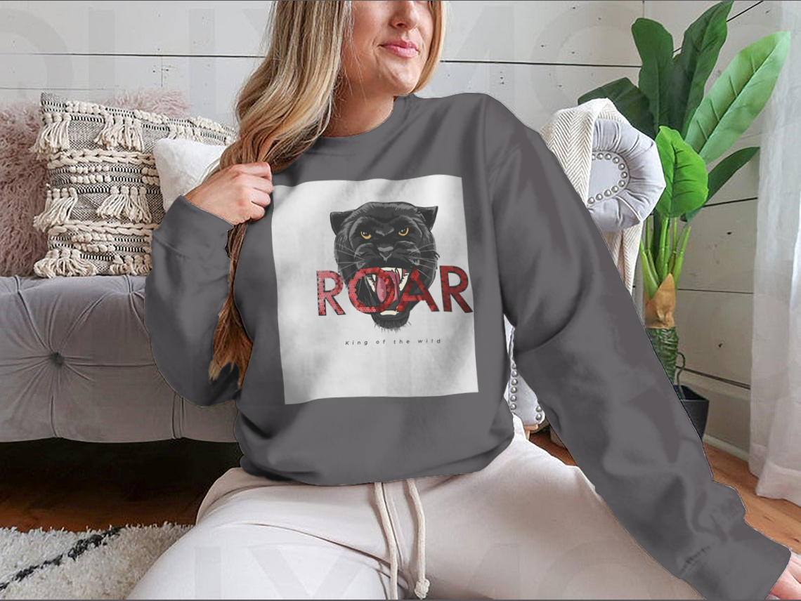 Stylish T-shirt featuring a sequins glitter panther head illustration with the Roar slogan, made from soft cotton fabric.