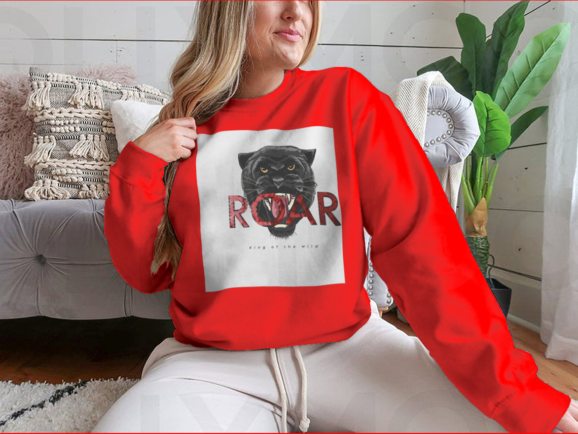 Stylish T-shirt featuring a sequins glitter panther head illustration with the Roar slogan, made from soft cotton fabric.