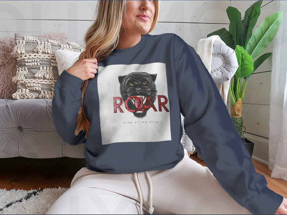 Stylish T-shirt featuring a sequins glitter panther head illustration with the Roar slogan, made from soft cotton fabric.