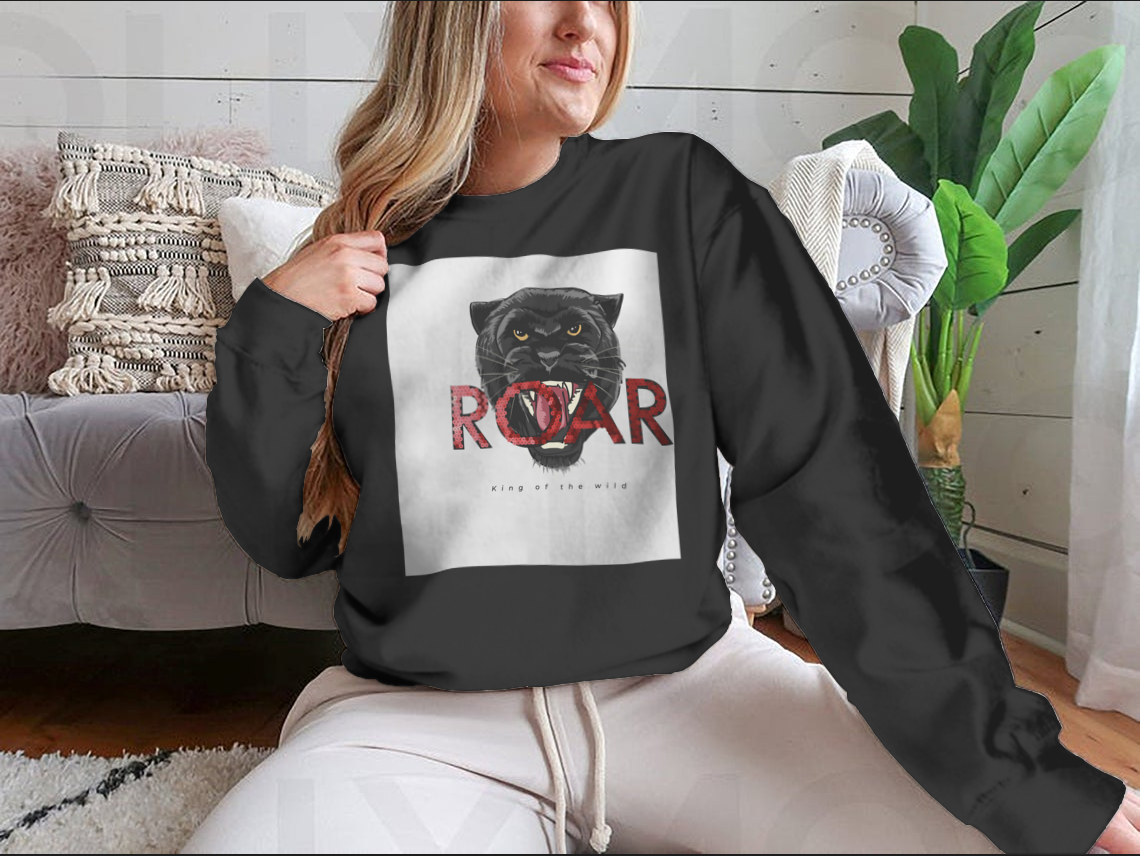 Stylish T-shirt featuring a sequins glitter panther head illustration with the Roar slogan, made from soft cotton fabric.