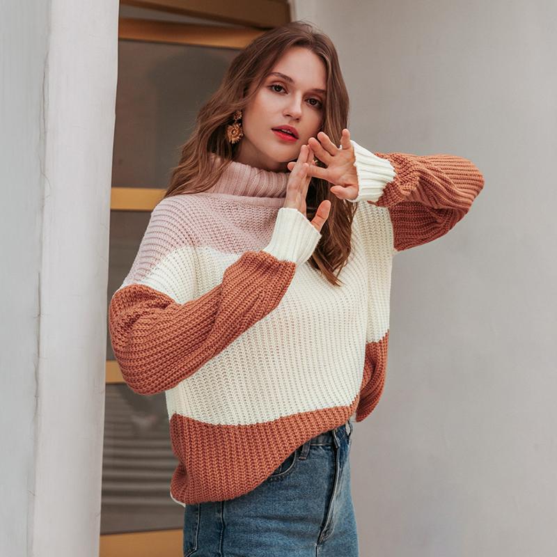 A stylish women's striped turtleneck winter sweater featuring a loose fit and retro design, perfect for casual winter outfits.