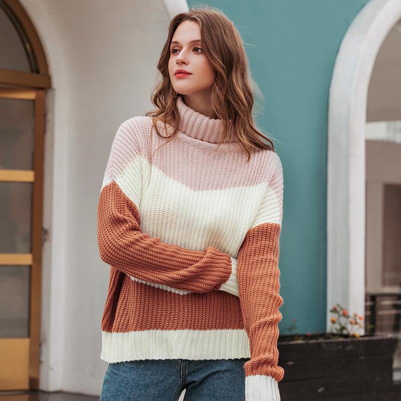 A stylish women's striped turtleneck winter sweater featuring a loose fit and retro design, perfect for casual winter outfits.