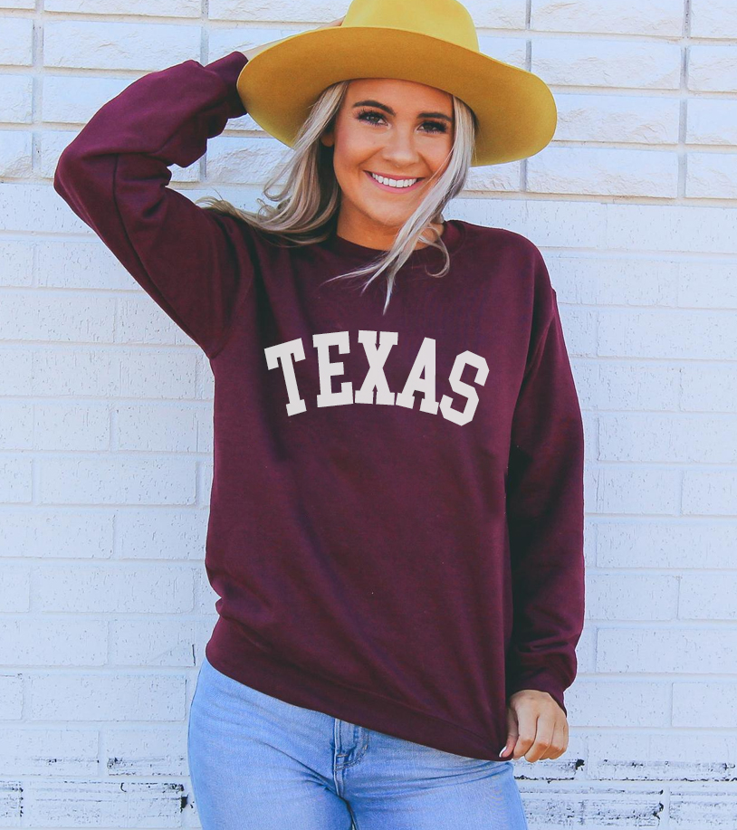 A cozy Texas Sweatshirt featuring a classic crew neck design, made from a soft cotton-polyester blend, perfect for casual wear.