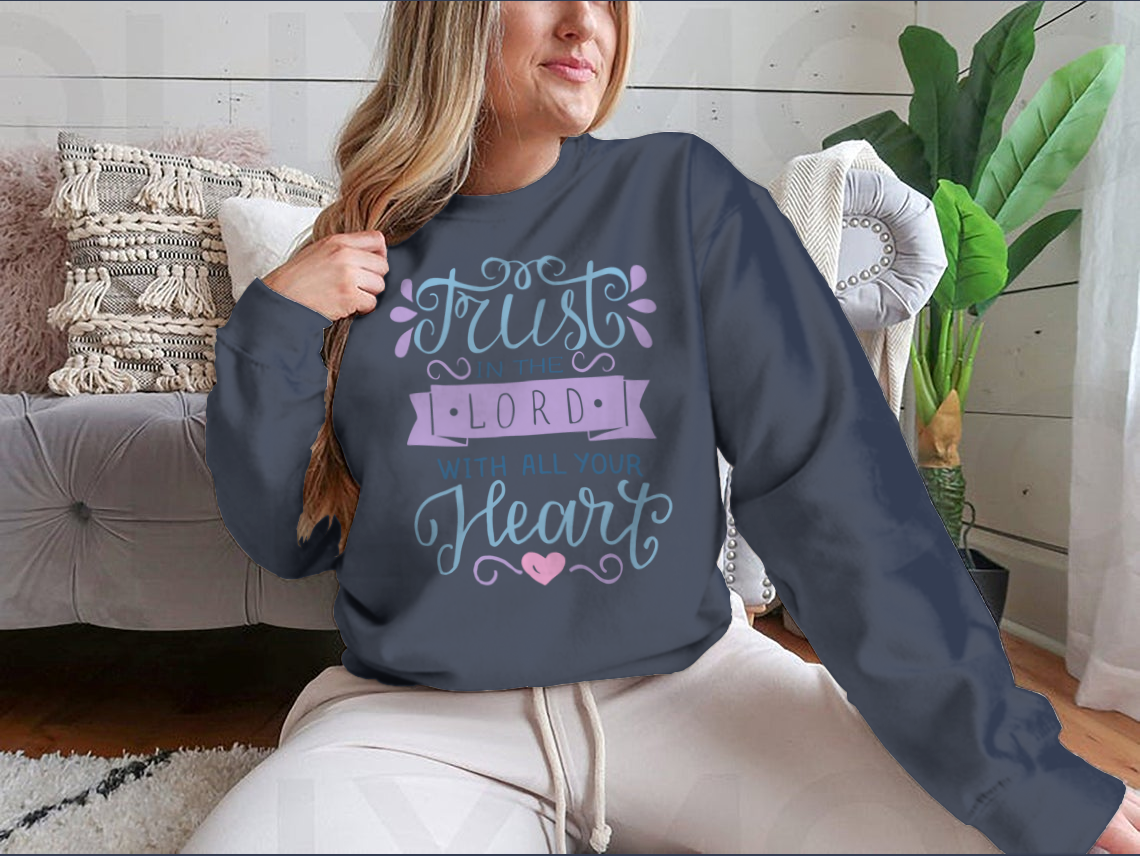 A comfortable and stylish T-shirt featuring the inspirational phrase 'Trust In The Lord With All Your Heart', perfect for motivational wear.