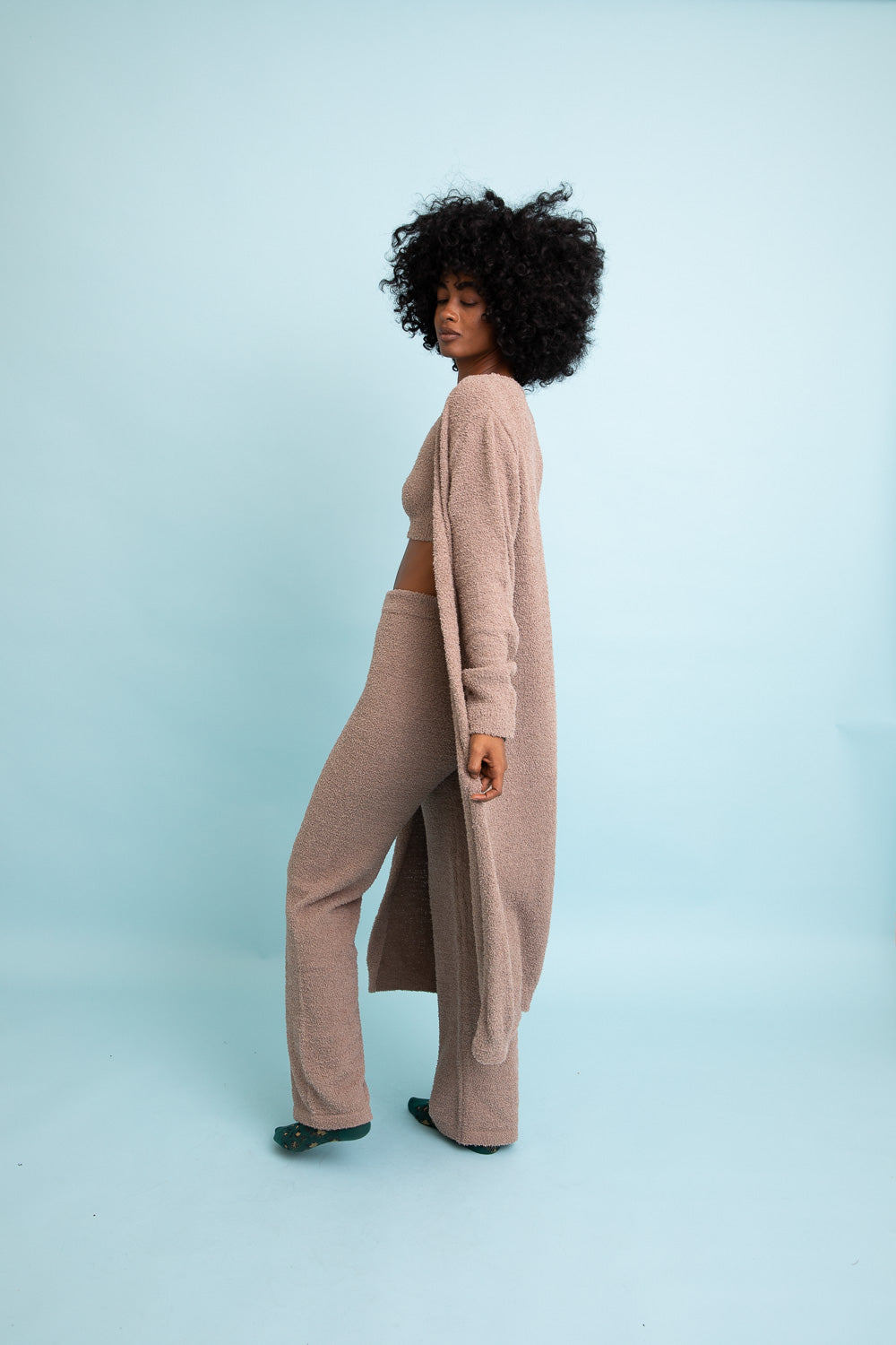 A cozy Ultra-soft Boucle Longline Cardigan in a stylish design, perfect for chilly days and nights.