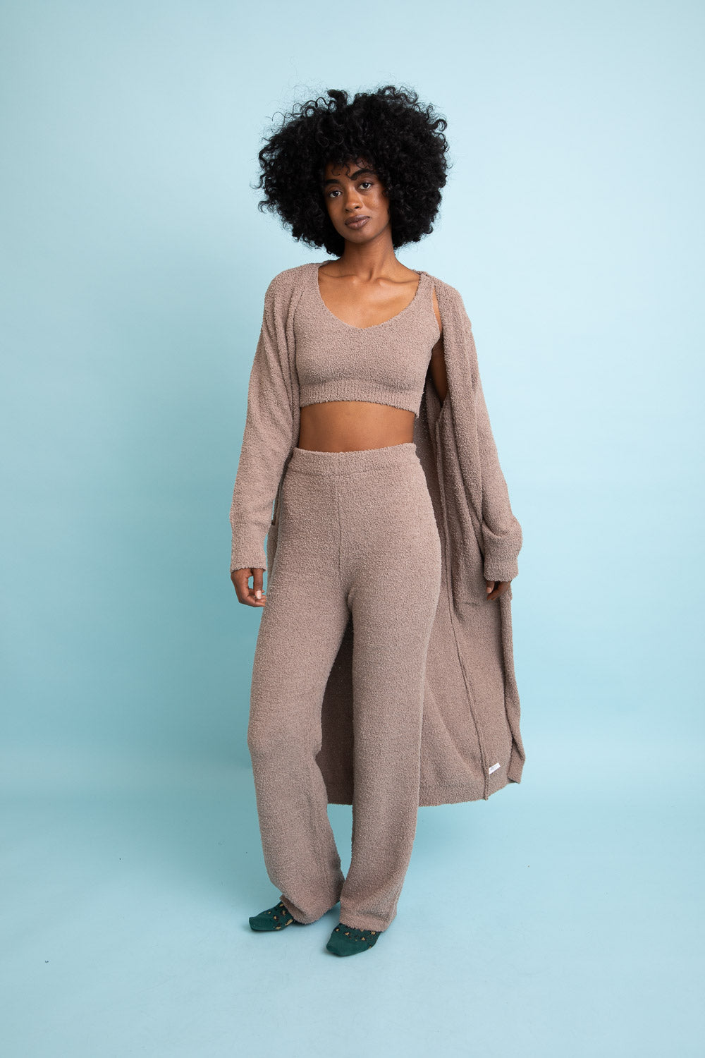 A cozy Ultra-soft Boucle Longline Cardigan in a stylish design, perfect for chilly days and nights.