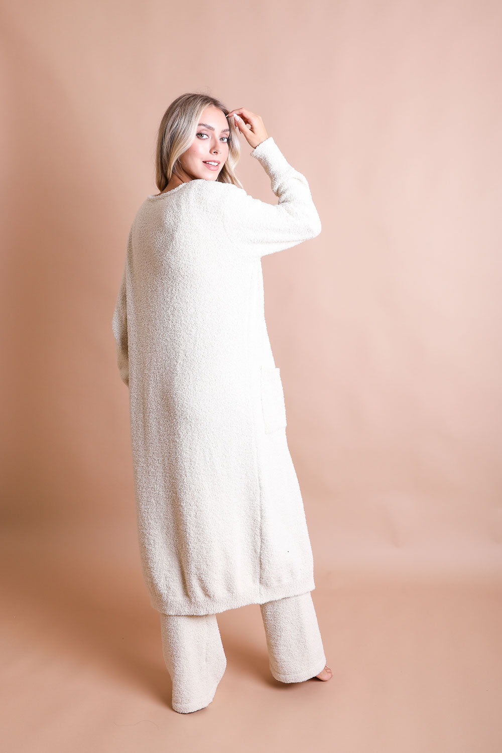 A cozy Ultra-soft Boucle Longline Cardigan in a stylish design, perfect for chilly days and nights.