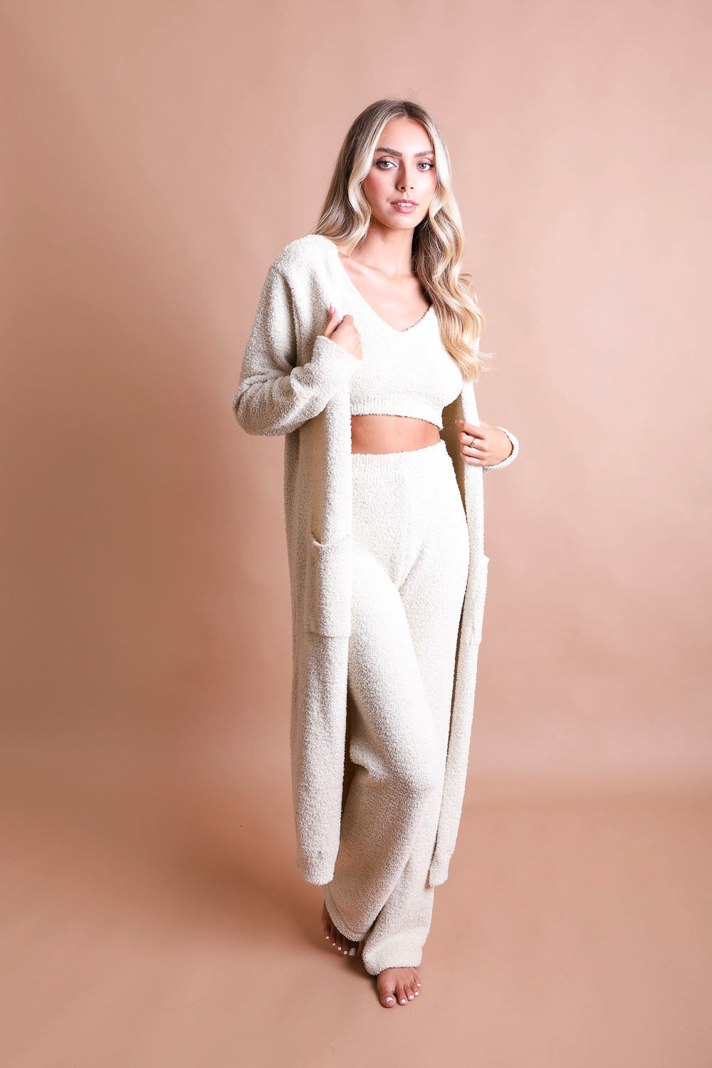 A cozy Ultra-soft Boucle Longline Cardigan in a stylish design, perfect for chilly days and nights.