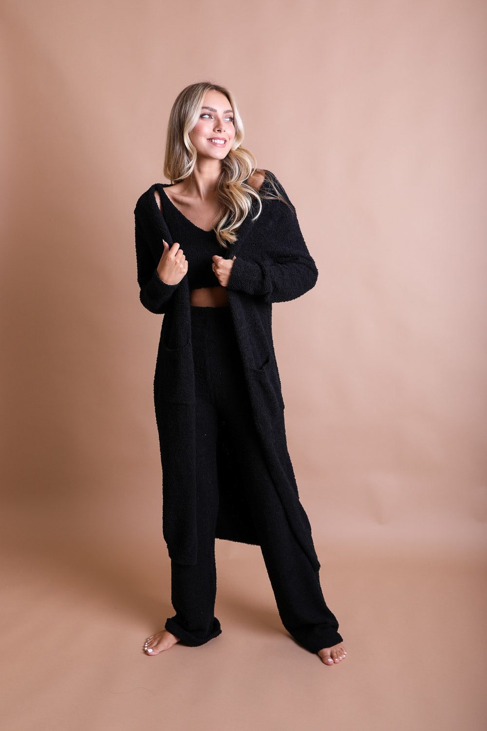 A cozy Ultra-soft Boucle Longline Cardigan in a stylish design, perfect for chilly days and nights.