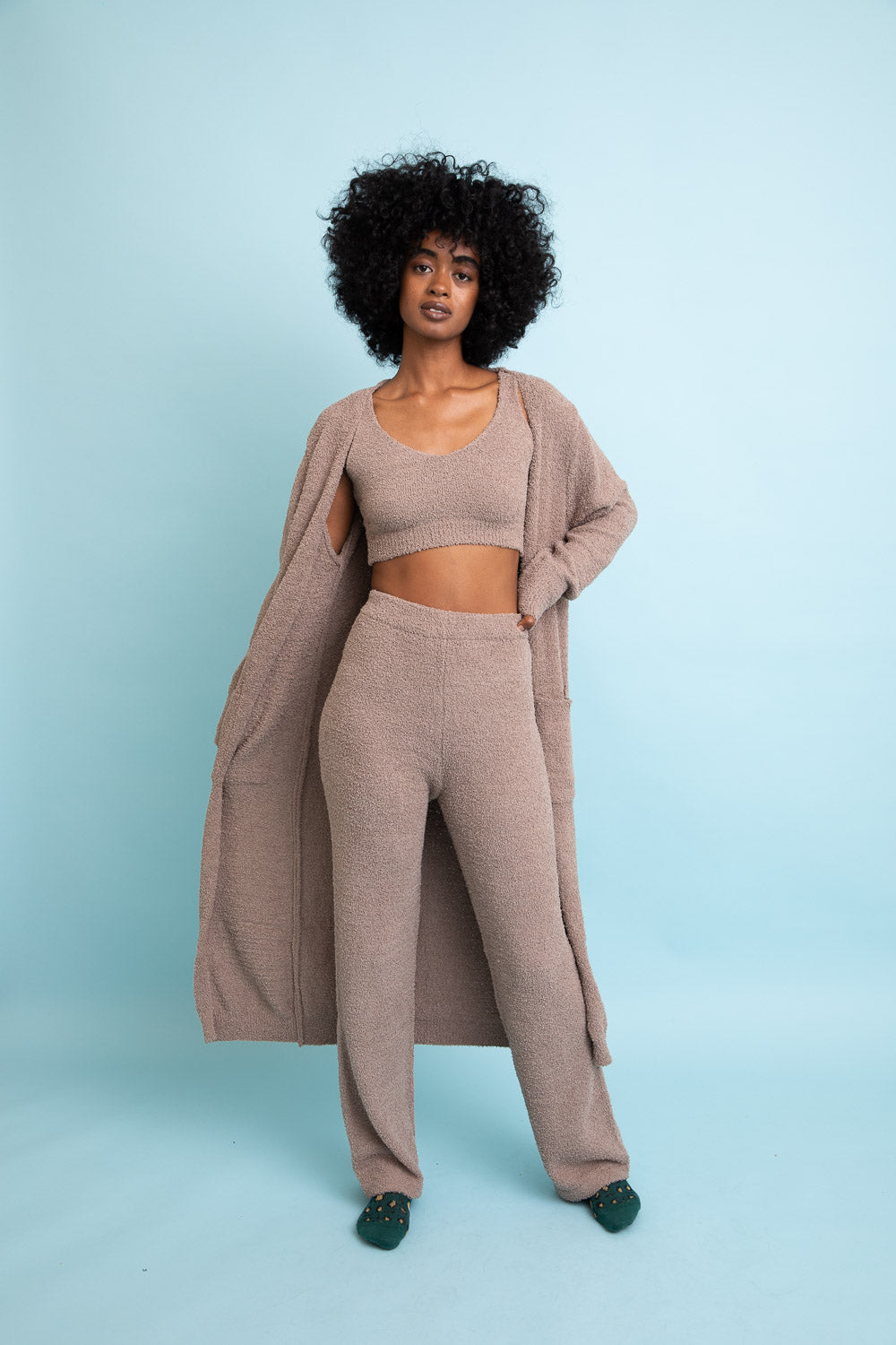 A cozy Ultra-soft Boucle Longline Cardigan in a stylish design, perfect for chilly days and nights.