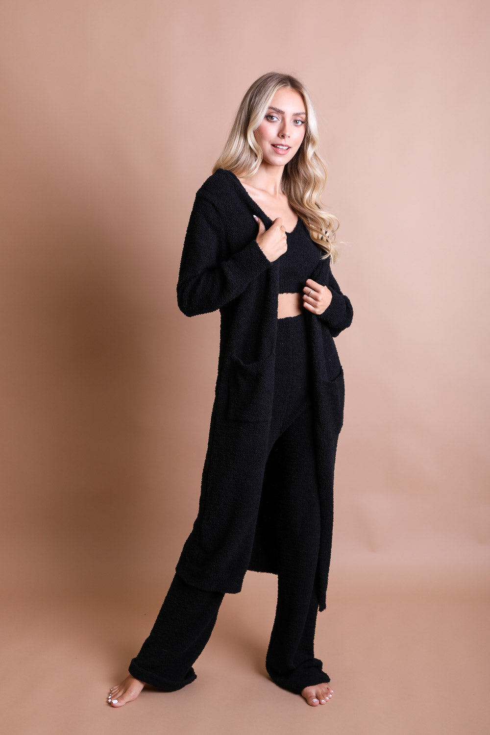 A cozy Ultra-soft Boucle Longline Cardigan in a stylish design, perfect for chilly days and nights.