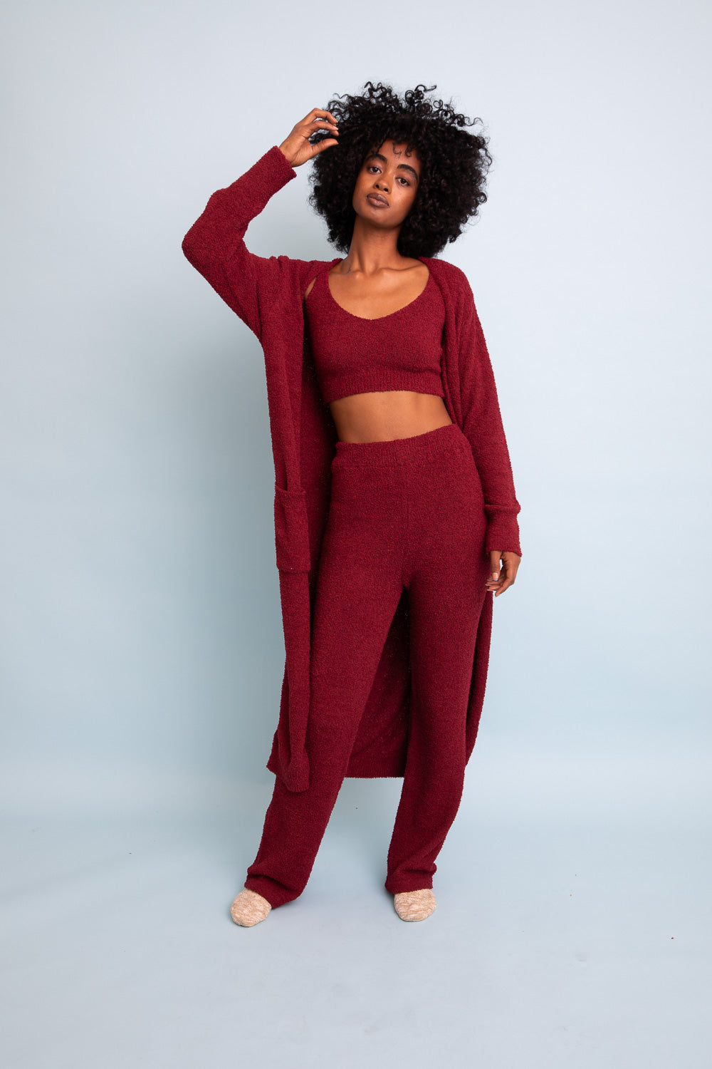 A cozy Ultra-soft Boucle Longline Cardigan in a stylish design, perfect for chilly days and nights.