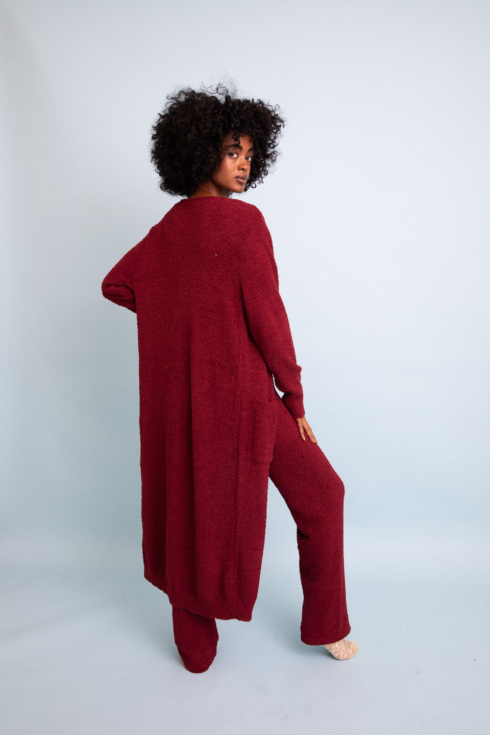 A cozy Ultra-soft Boucle Longline Cardigan in a stylish design, perfect for chilly days and nights.