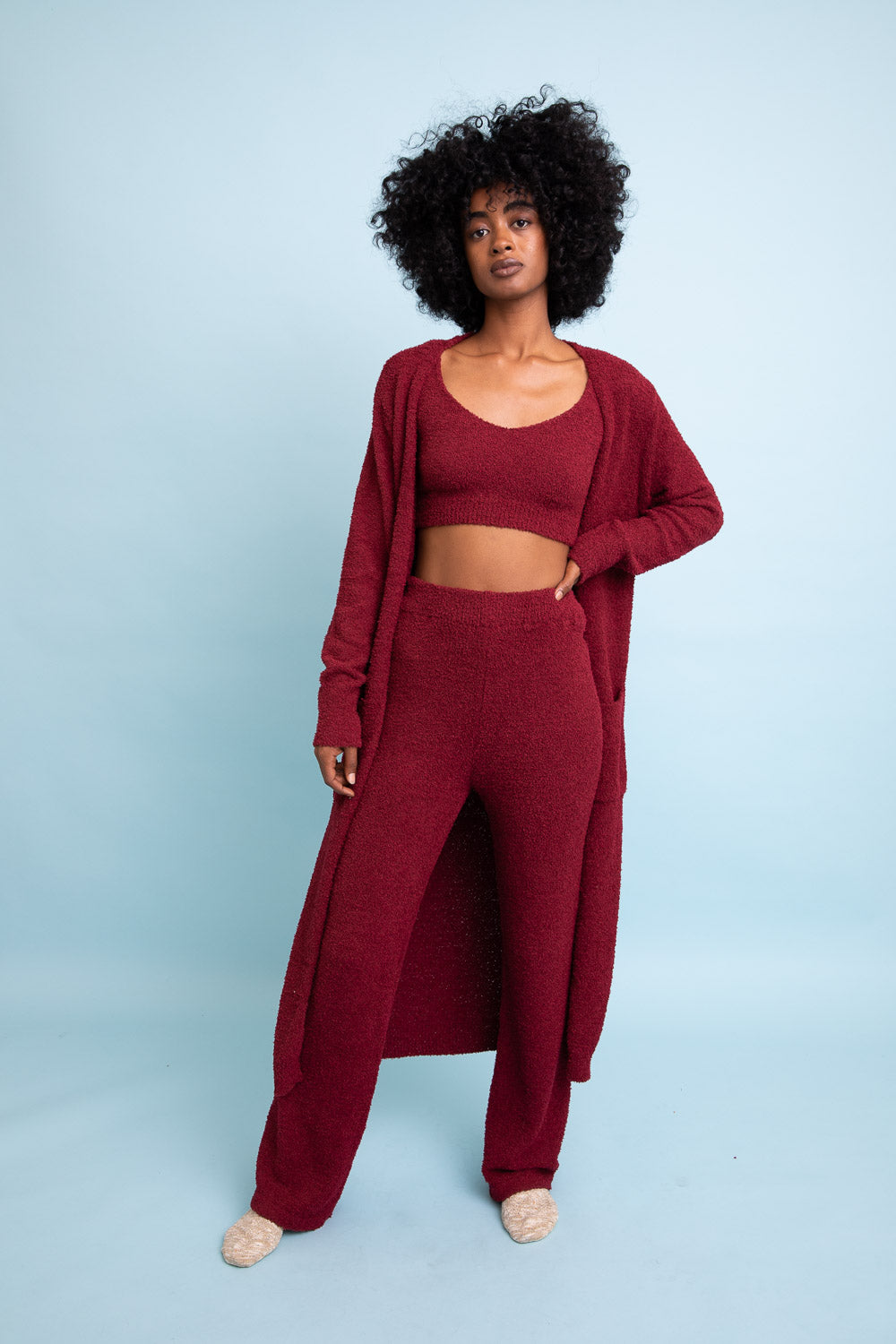 A cozy Ultra-soft Boucle Longline Cardigan in a stylish design, perfect for chilly days and nights.