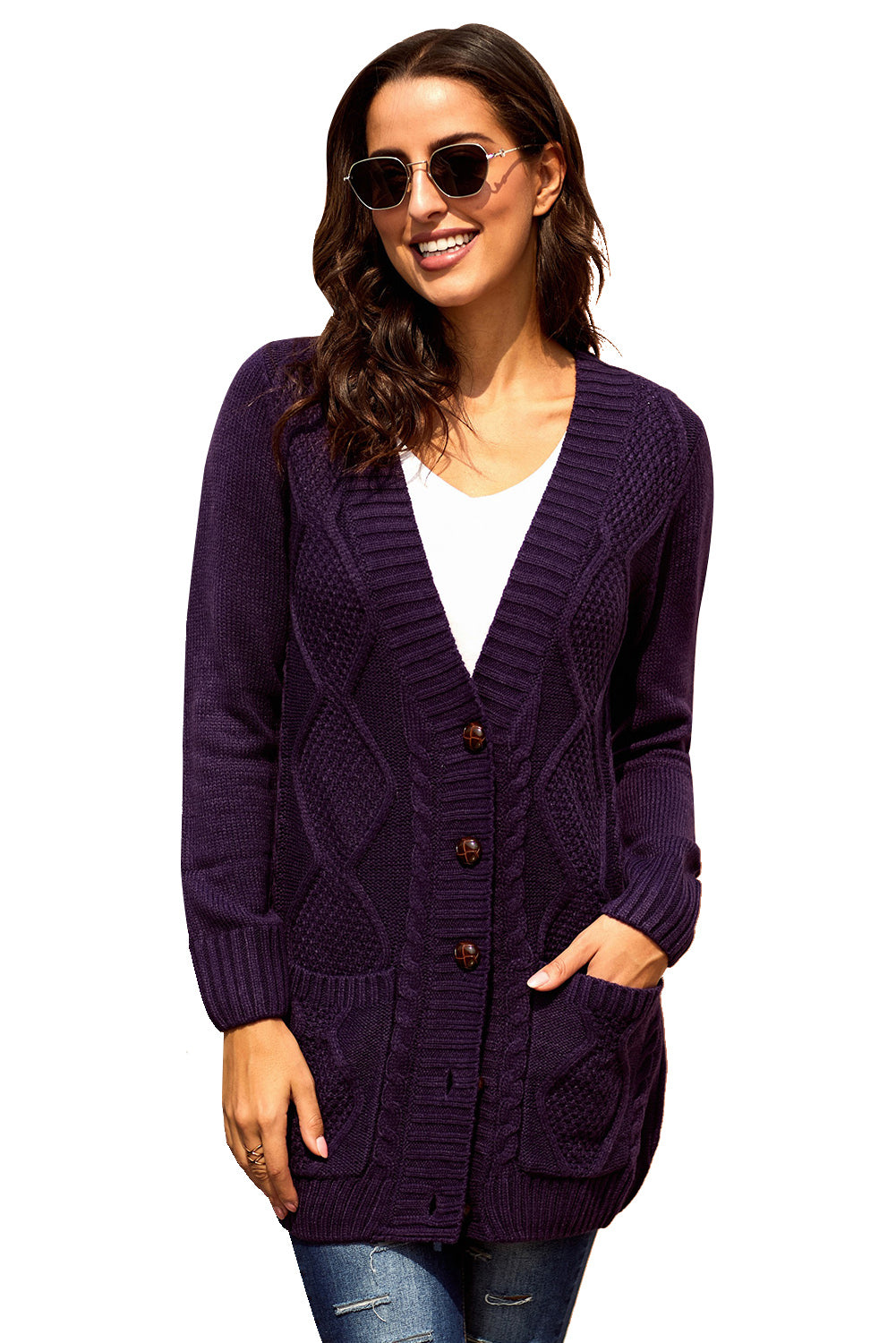 Women wearing a purple cardigan with front pockets and button closure, showcasing a stylish knit pattern.