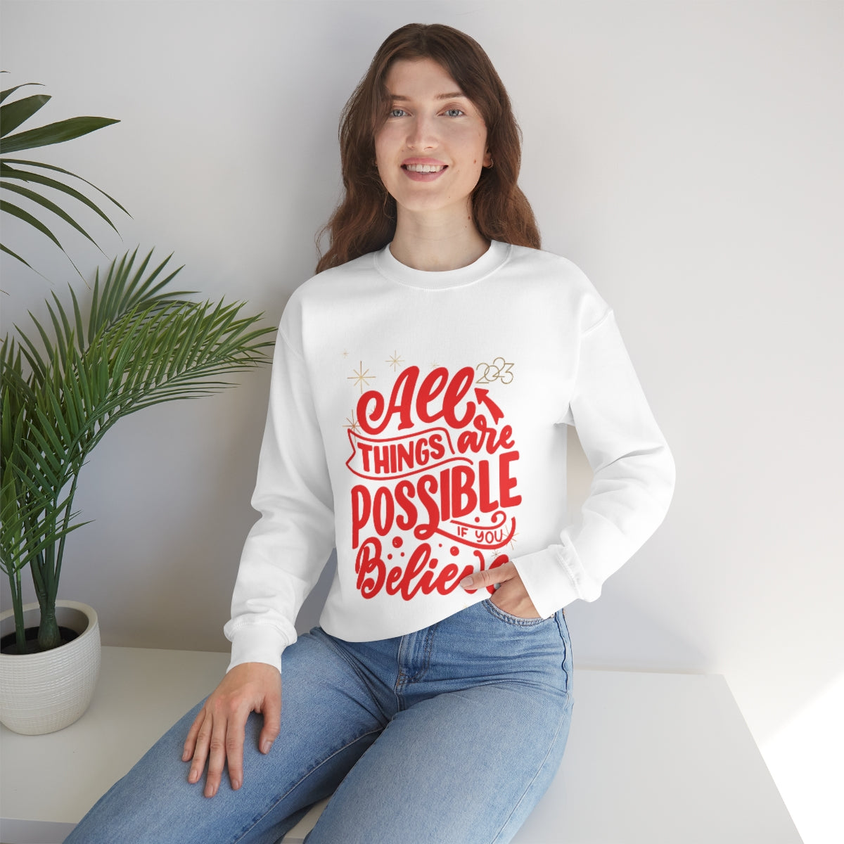 Women's 2023 Positive Message Sweatshirt in white, showcasing a loose fit and ribbed knit collar, perfect for comfort and style.