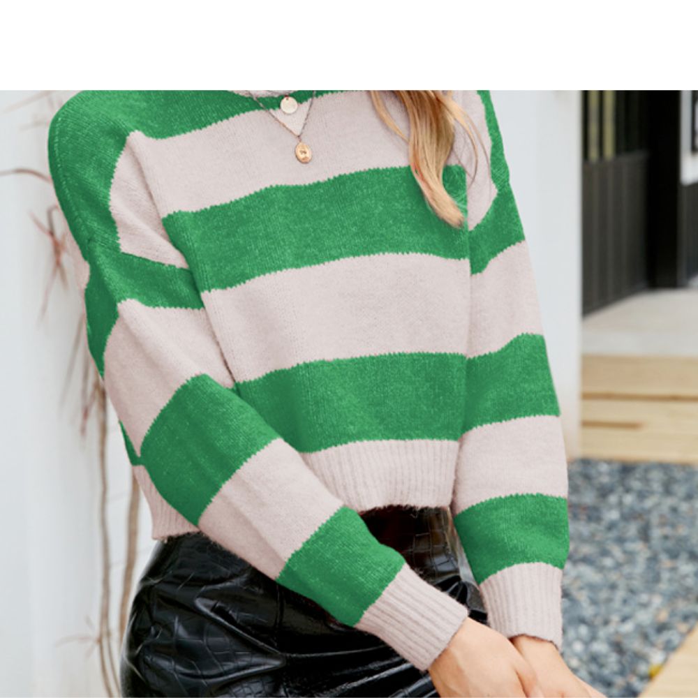 A stylish women's cropped striped sweater featuring wide contrasting stripes in red, green, and yellow, perfect for casual and trendy outfits.