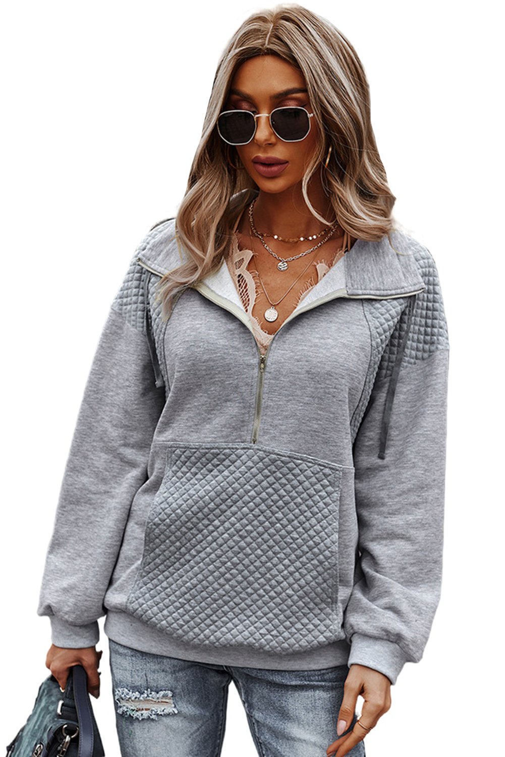 Women's gray quilted patch half zipper sweatshirt featuring a stylish design with pockets and a turn-down collar.