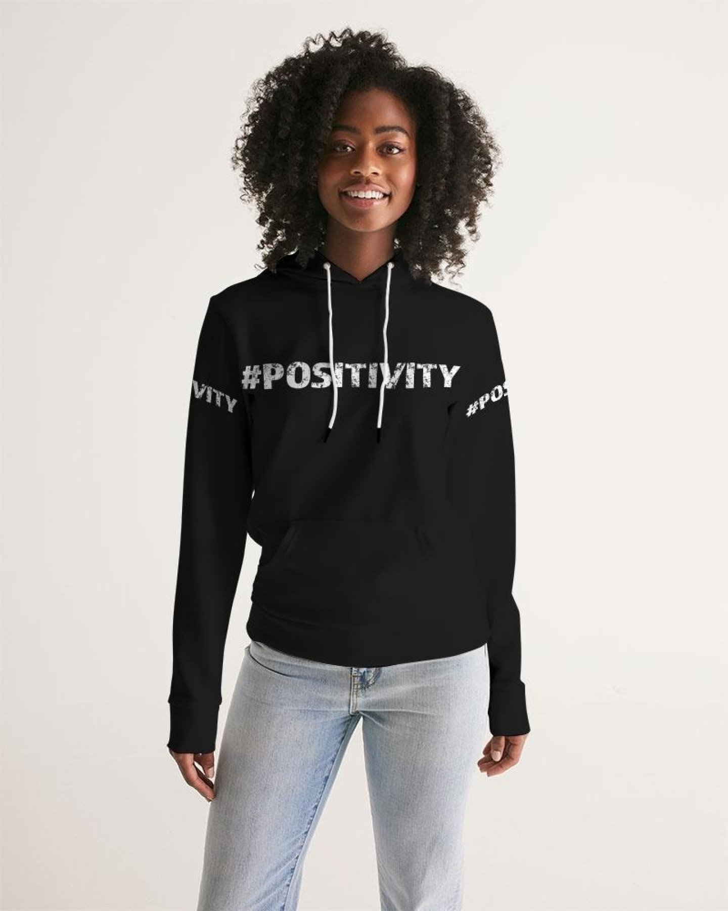 A stylish women's pullover hoodie featuring a graphic design promoting positivity, made from premium fabric with a drawstring hood and front pocket.