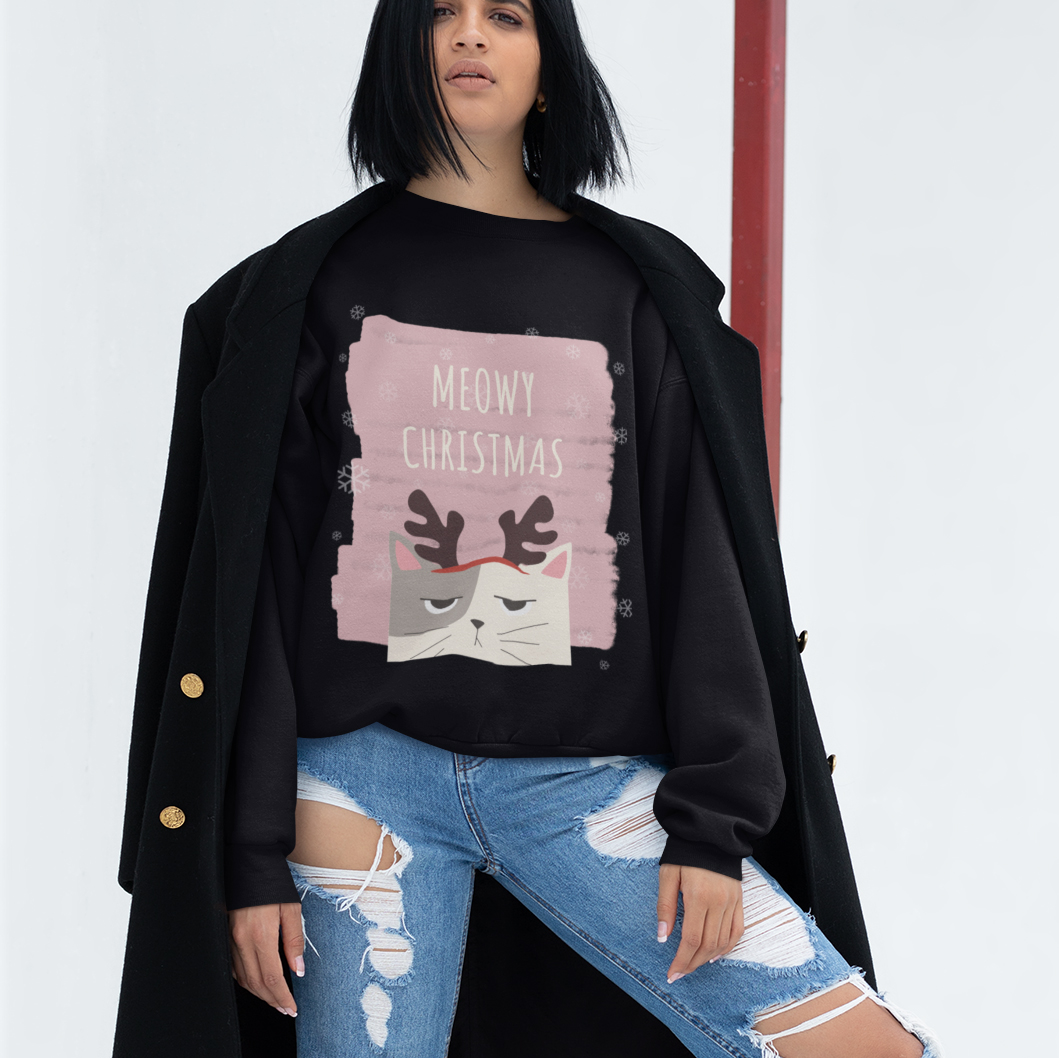 Womens Meowy Christmas Sweatshirt featuring a festive design with a loose fit and ribbed knit collar, perfect for holiday celebrations.