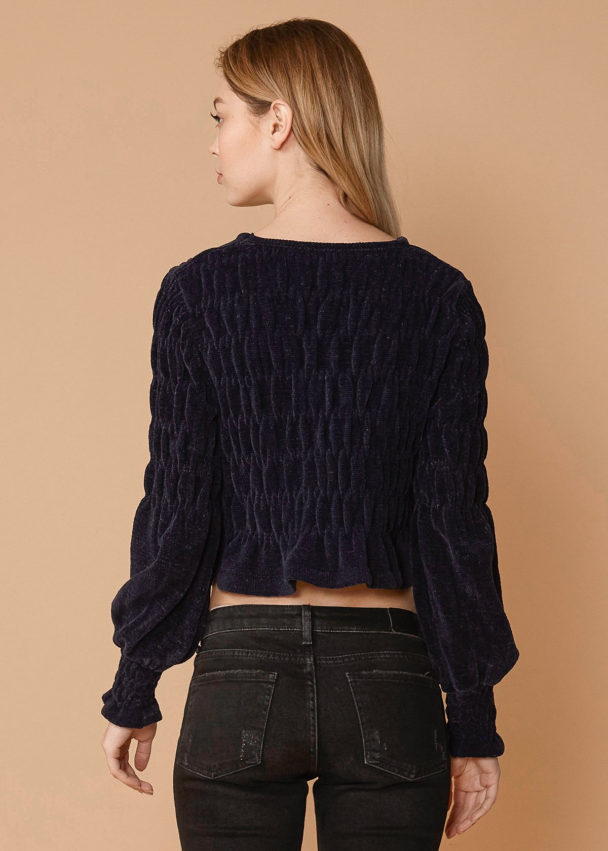 Women's Midnight Peplum Sweater featuring a crewneck and gathered knit top in a rich midnight color.