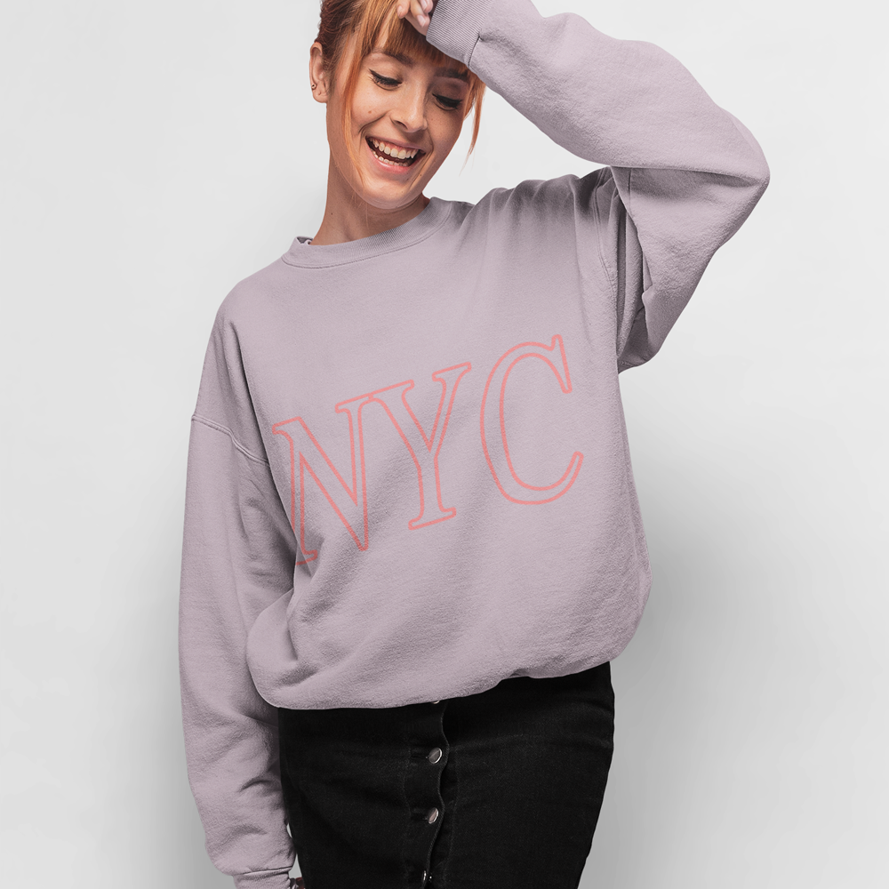 Womens Pink NYC Crewneck Sweatshirt displayed on a mannequin, showcasing its loose fit and stylish logo.