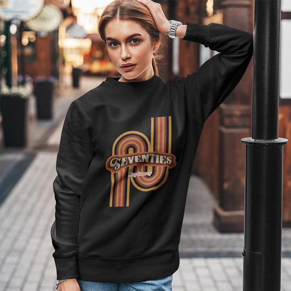 Womens Retro 70's Crewneck Sweatshirt in soft fabric, showcasing a loose fit and classic crewneck design.