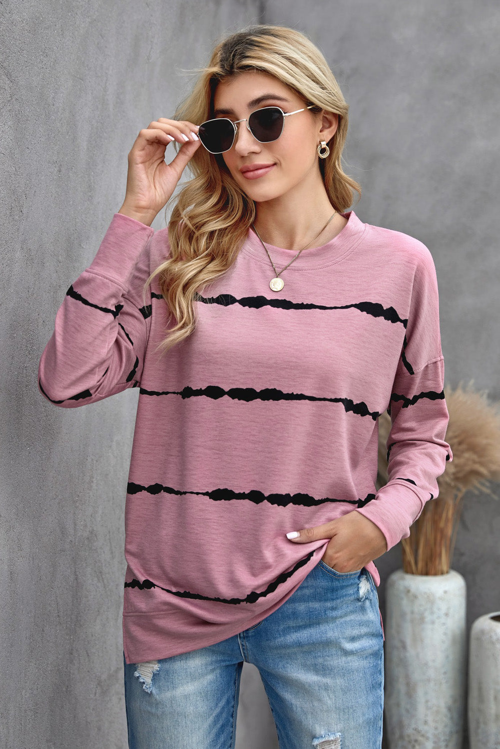 Womens Tie-dye Stripes Pink Sweatshirt featuring a vibrant pink color with stylish striped patterns, perfect for casual wear.