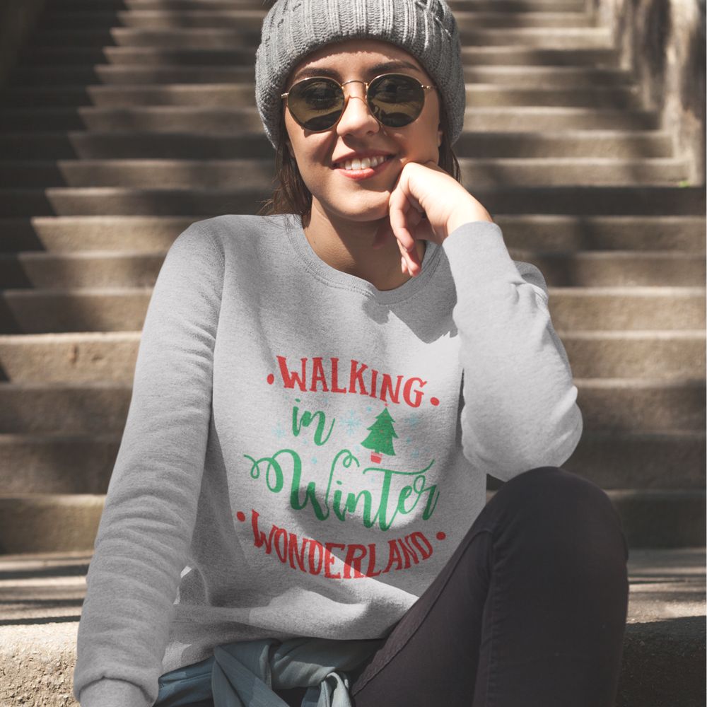 Womens Winter Wonderland Sweatshirt in white, featuring a loose fit and ribbed collar, perfect for holiday festivities.