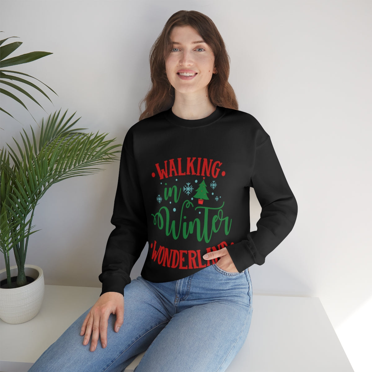 Womens Winter Wonderland Sweatshirt in white, featuring a loose fit and ribbed collar, perfect for holiday festivities.