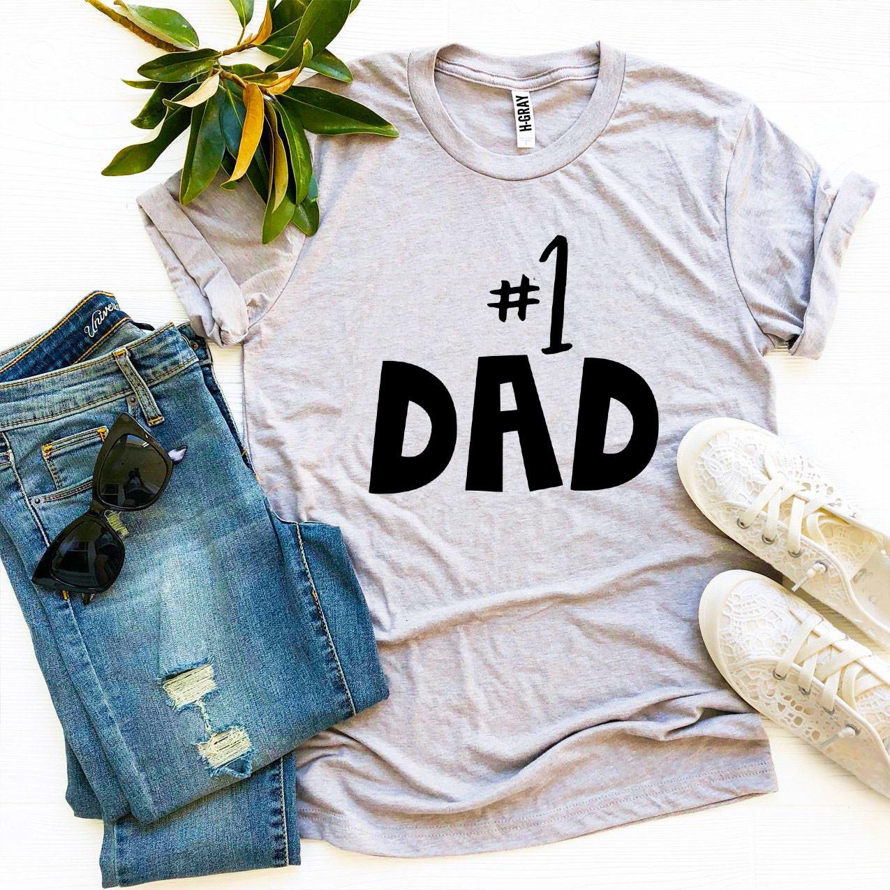 A stylish #1 Dad T-shirt made from premium ring spun cotton, featuring a bold flex print design celebrating fatherhood.