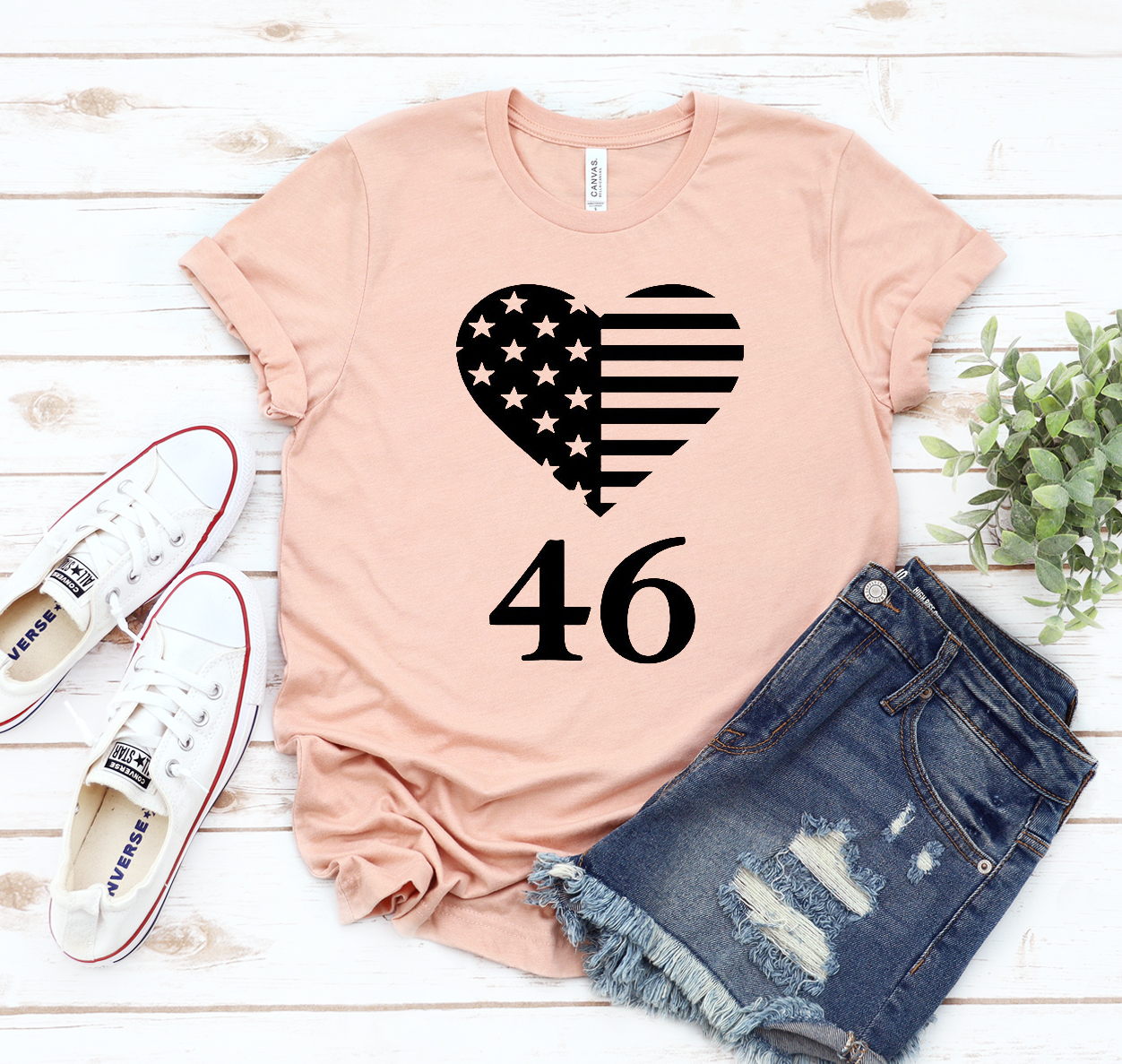 A classic unisex 46 USA T-shirt made from soft airlume cotton, displayed in various sizes.