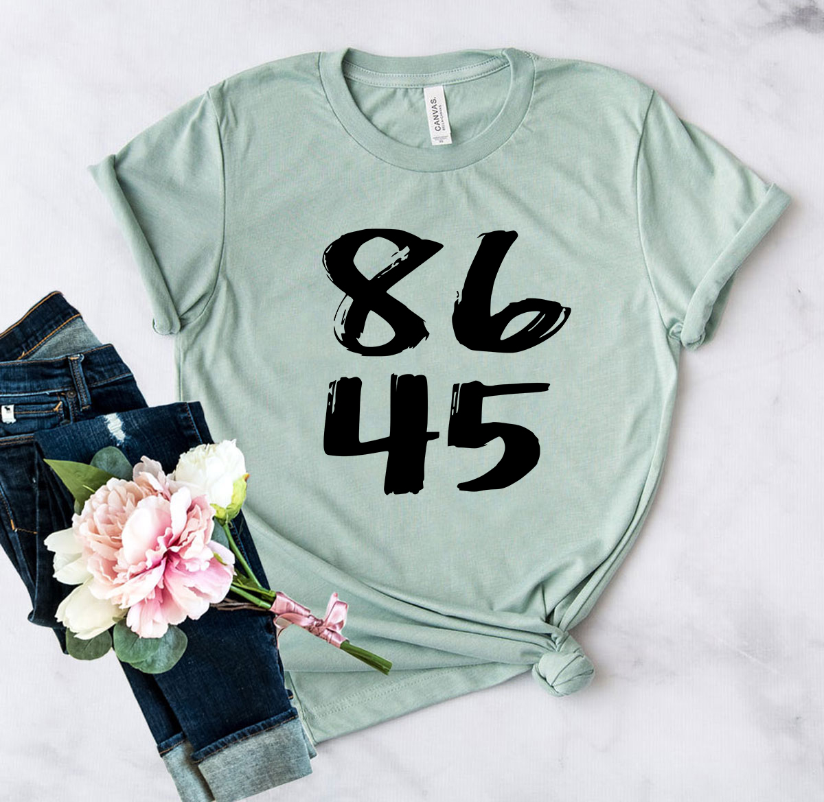 A stylish 8645 Unisex T-shirt displayed in multiple colors, showcasing its soft fabric and modern fit.