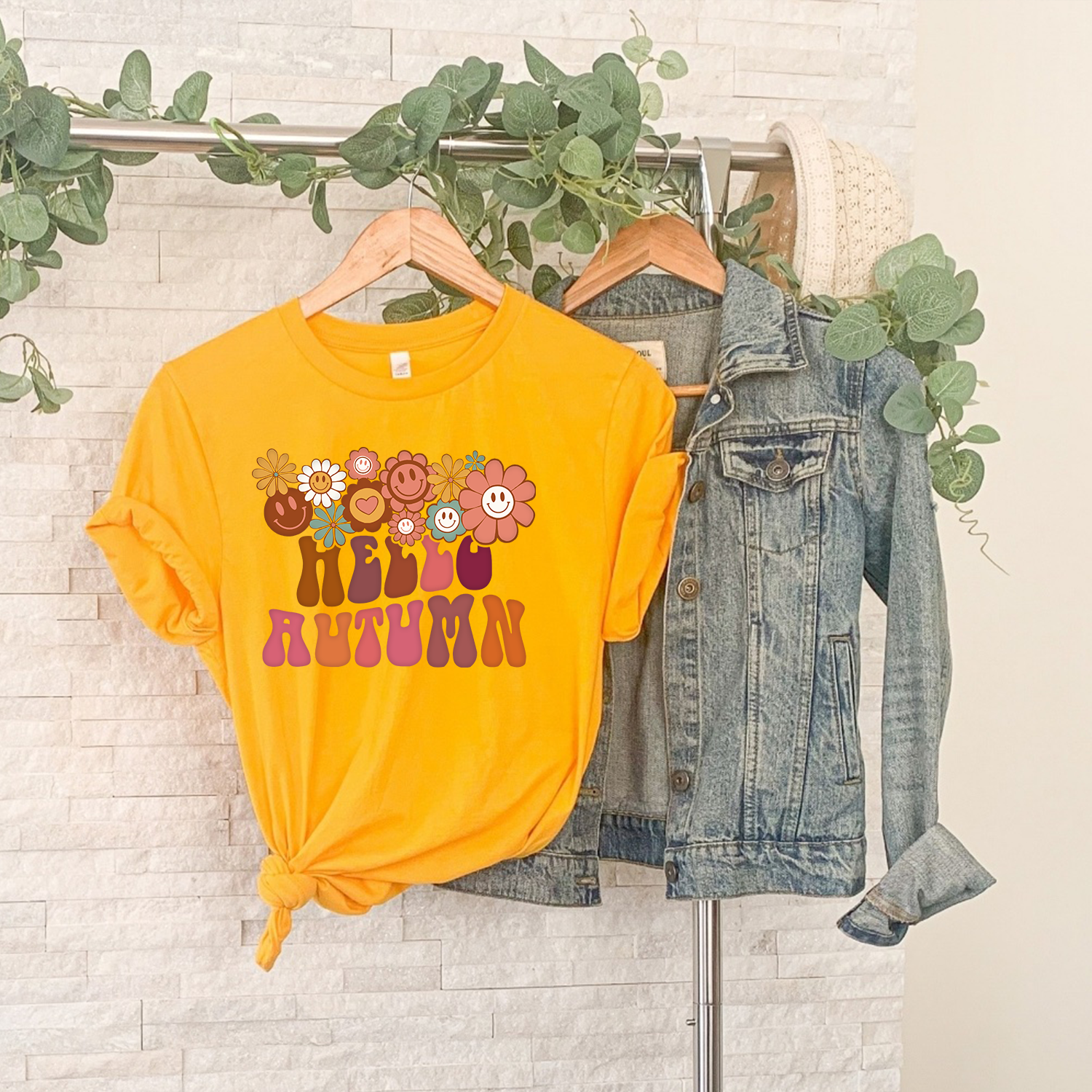 90s Hello Autumn Unisex T-shirt featuring vibrant autumn-themed design, perfect for casual wear.