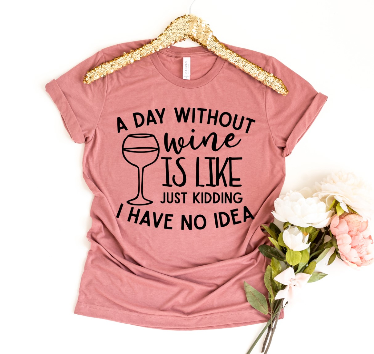 A Day Without Wine T-shirt made of premium ring spun cotton, featuring a vibrant flex print design, available in various sizes.