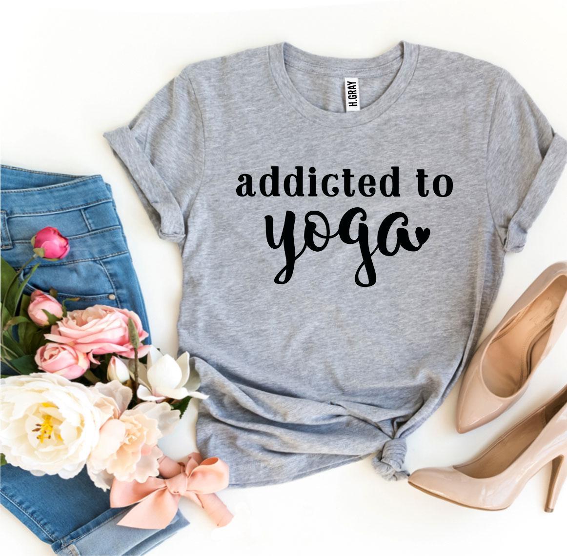 Addicted To Yoga T-shirt made of premium ring spun cotton, featuring a soft textile flex print design, available in various sizes.